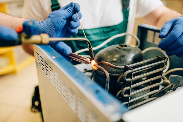 Repair of a refrigeration system by brazing during a DACTEC service